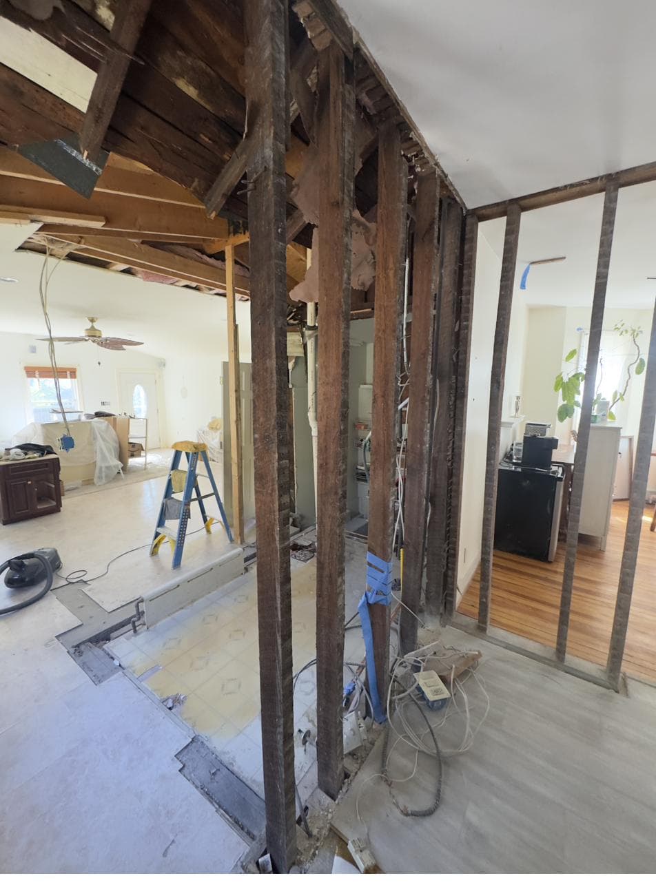Exposed framing and utilities during demolition