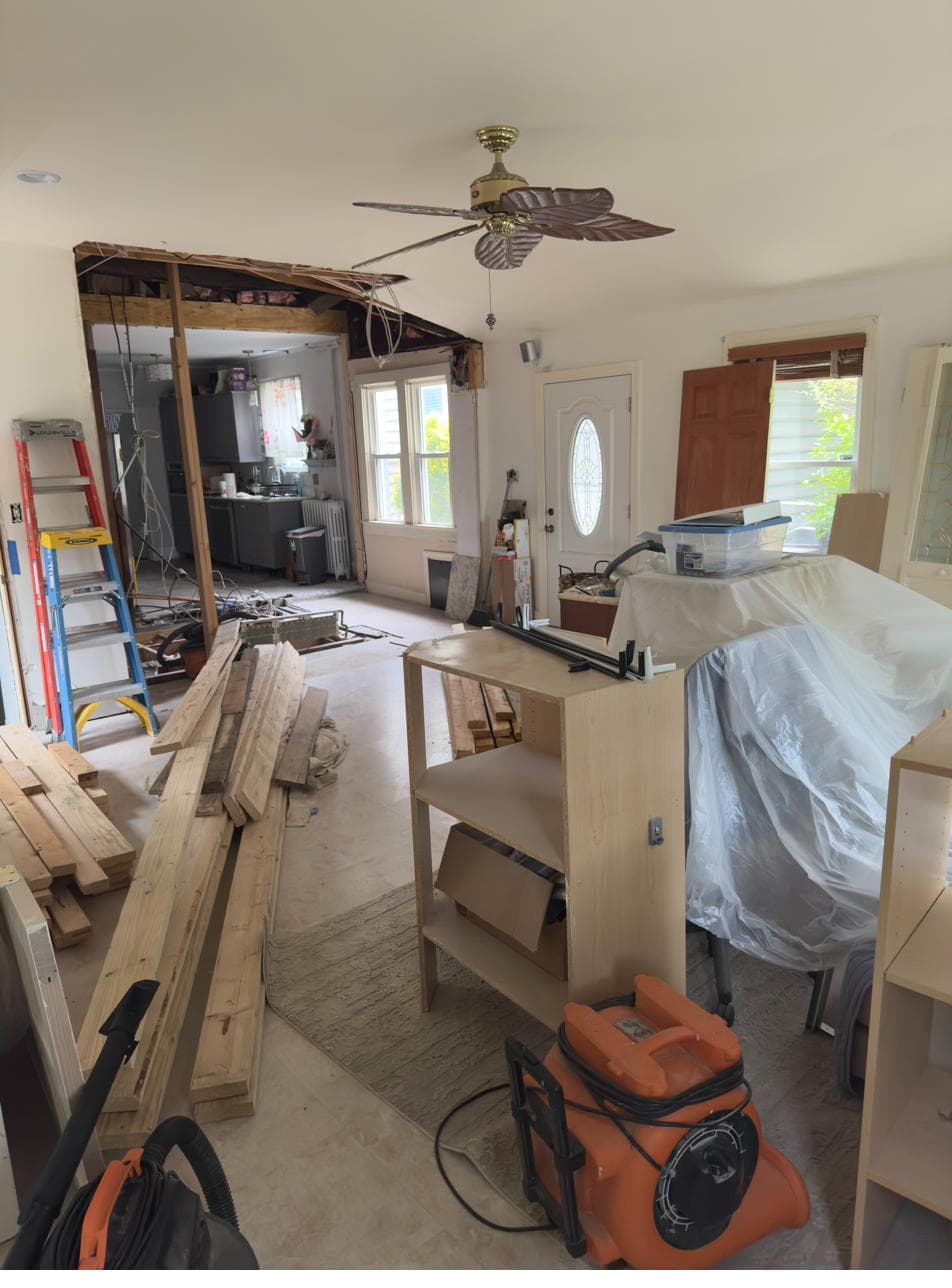 Open floor plan taking shape with new beam overhead