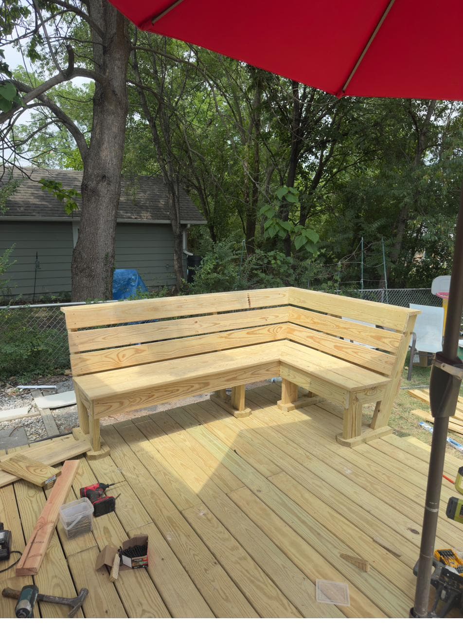 Custom built-in corner bench on new deck